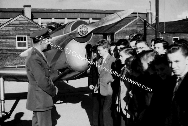 GROUP OF BELVEDERE BOYS WITH AIRMAN AND AEROPLANE